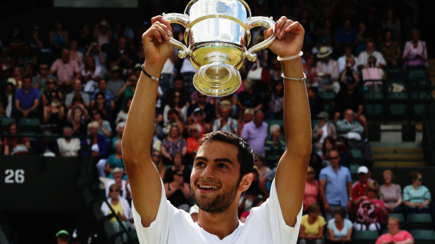 Noah Rubin with Wimbledon 2014 trophy