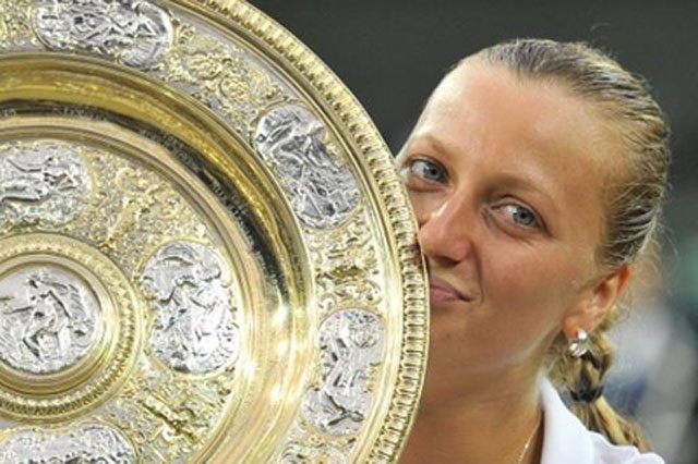 Petra Kvitova with Wimbledon 2014 trophy